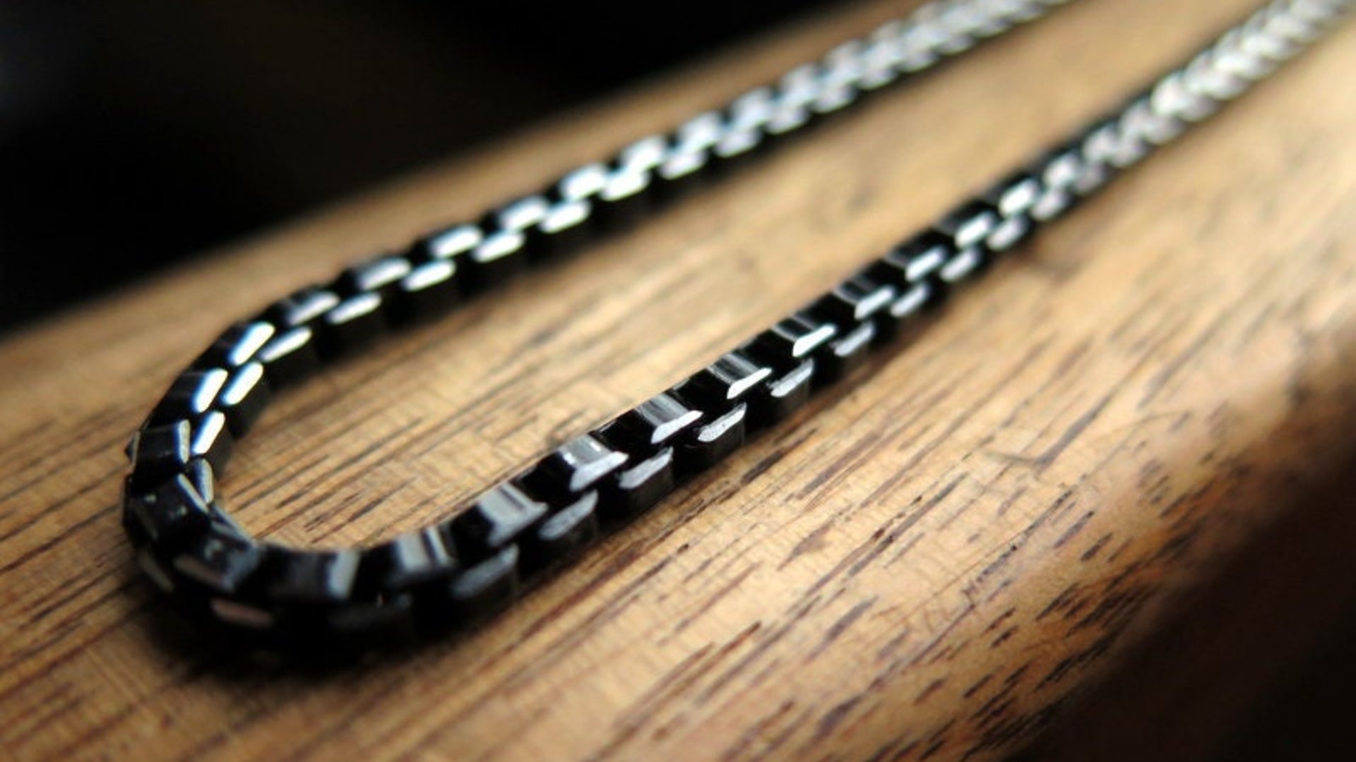 black necklace with silver edge. made in Canada.