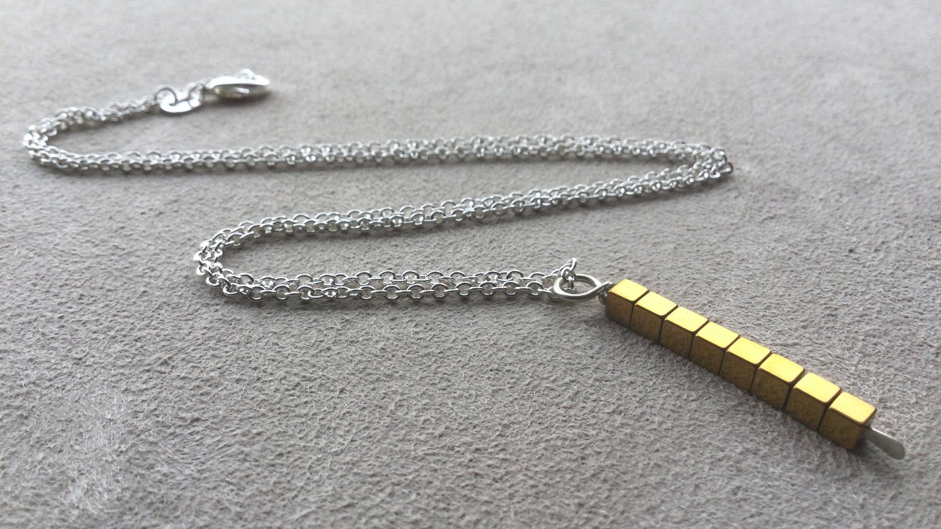 gold and silver necklace. mixed metal jewelry. modern jewellery