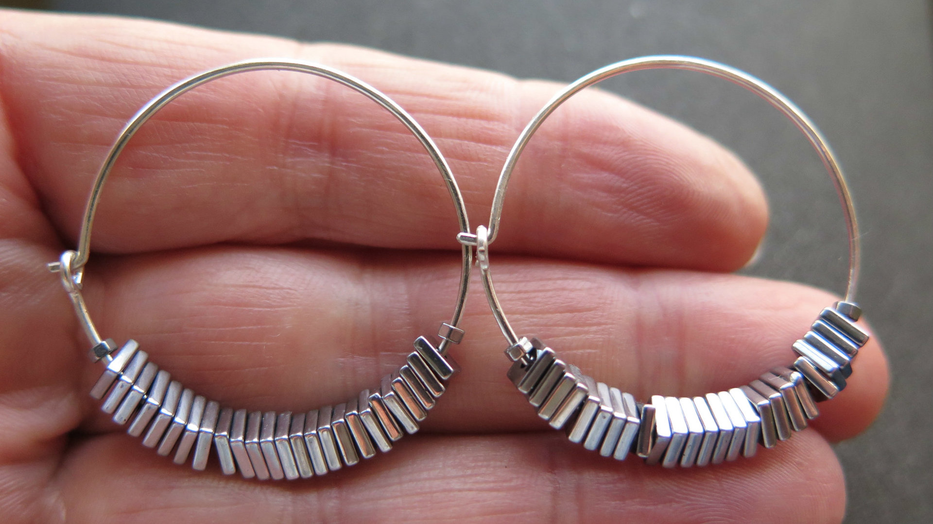 sterling silver hoop earrings. hematite jewelry. geometric hoops with square stones.